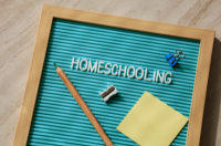 Sign board with "Homeschooling" spelled out