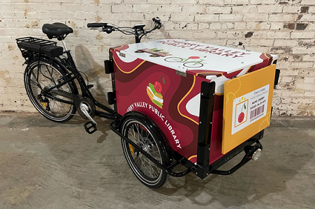 Bike with colorful cart at the front